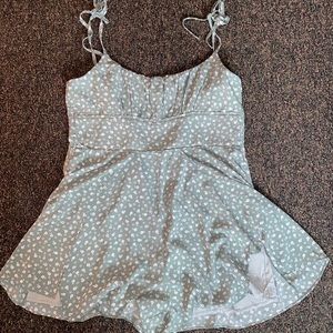 Green romper with floral pattern Princess Polly